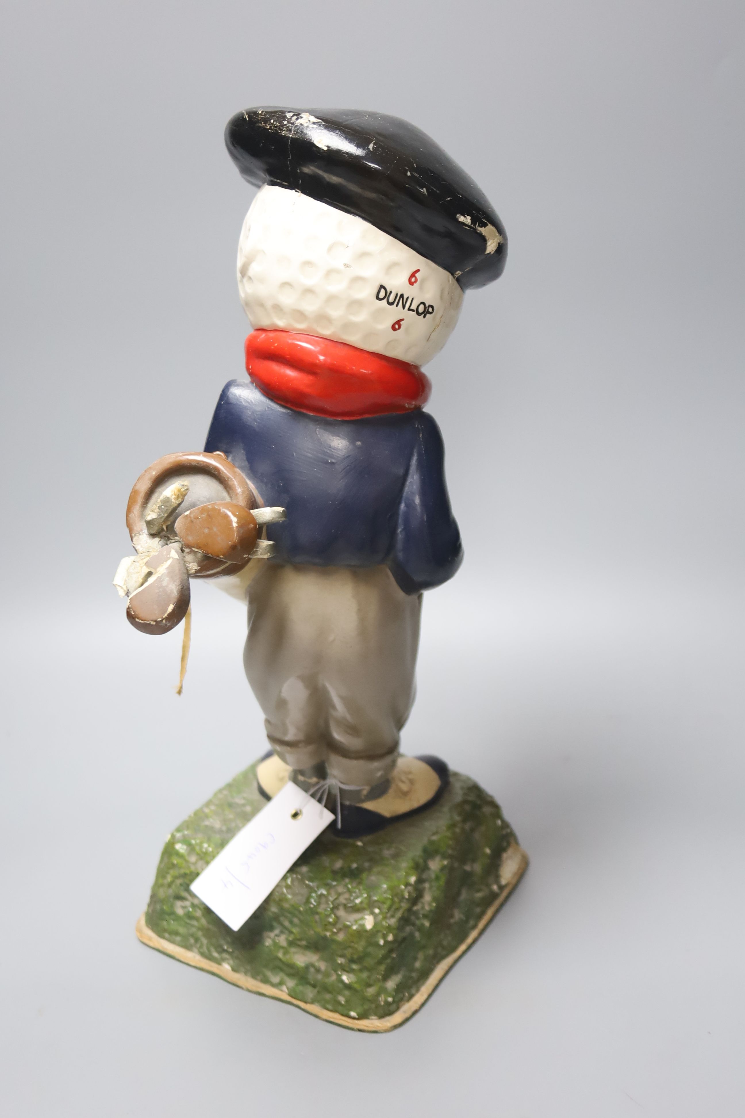 A composition advertising golfing figure We Play Dunlop, height 37cm